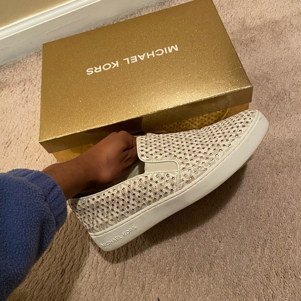 Michael Kors slip on sneakers.
